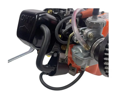 Rev Carbon Fiber LO206 Catch Can Attached to an LO206 Engine.