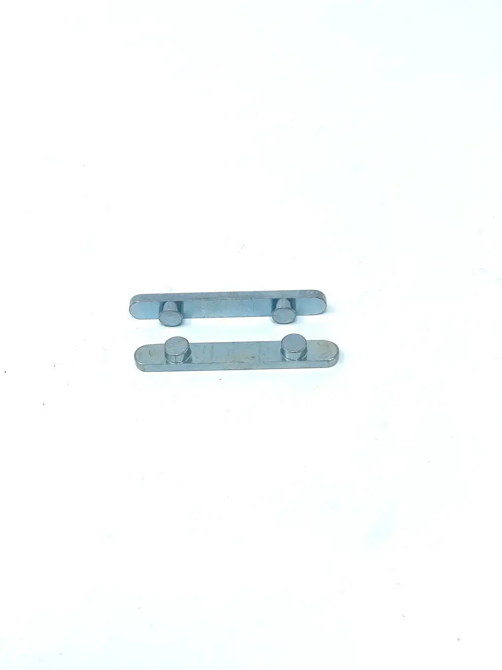 Two Tillotson T4 Pegged Karting Axle Keys Next to Each Other.